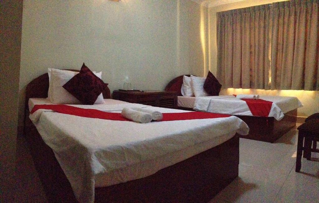 Homeland Guesthouse Phnom Penh Zimmer foto